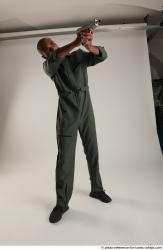 ERIC IN ACTION WITH GUN